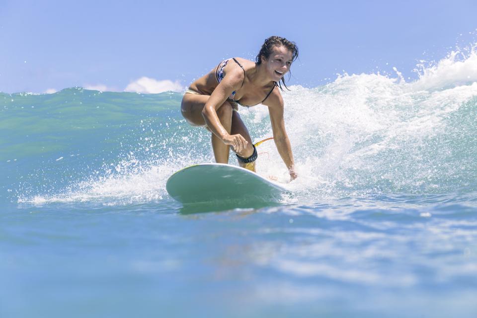 Indonesia, Bali, female surfer